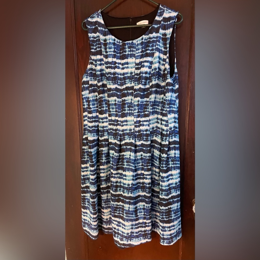 Sleeveless Calvin Klein dress with pockets.
